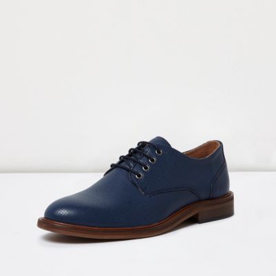 Blue leather lace up shoes